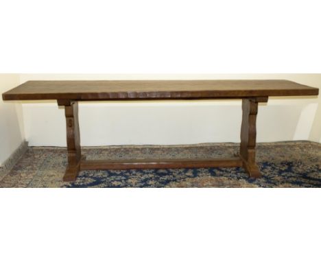 Robert "Mouseman" Thompson of Kilburn - large oak refectory style dining table, the adzed pegged rectangular planked top on s