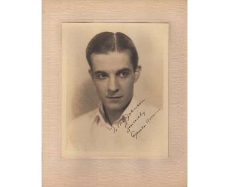 NOVARRO RAMON: (1899-1968) Mexican Actor. Vintage signed and inscribed sepia 8 x 10 photograph of Novarro in a head and shoul