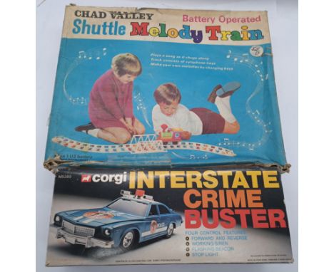 Corgi, Chad Valley a boxed pair of battery power toys, to include; Corgi M5350 - Crime Buster, Chad Valley - Shuttle Melody T