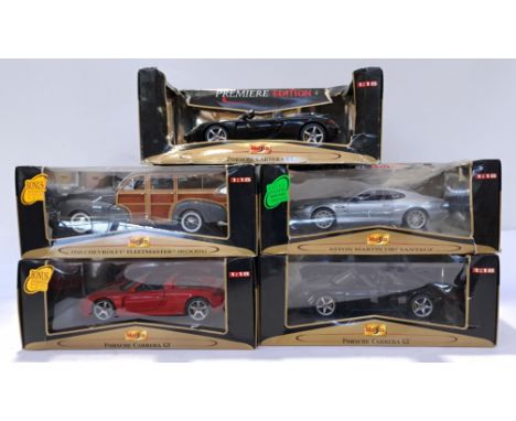 Maisto, a boxed Group of 1:18 Scale Commercial Vehicles. Includes Aston Martin DB7 Vantage, Porsche Carrera GT with others. A