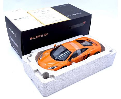 Autoart, a boxed 1/18 Scale McLaren 12C 76006 "Orange" with Certificate, Although not checked for completeness conditions gen