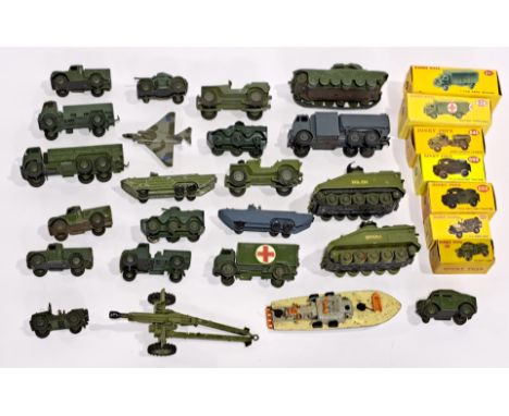 Dinky an unboxed military vehicle group, to include; 673 - Scout Car, 641 - Army 1 Ton Cargo Truck, as well as others. Condit