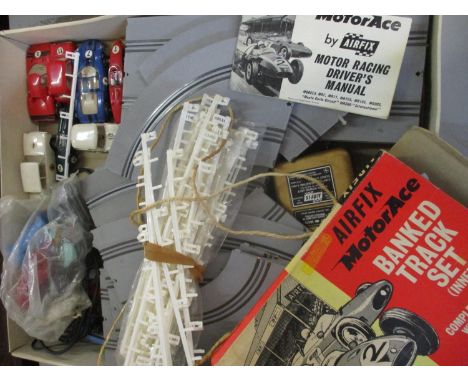 An Airfix Motor Ace banked track set, together with an Airfix Motor Racing Motorace set in original box, includes seven cars 