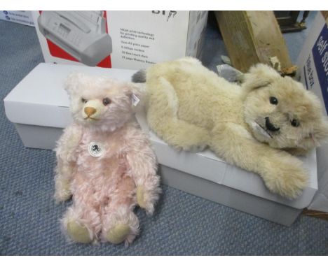 A boxed Steiff 1925 Replica bear, together with a boxed Steiff lion 