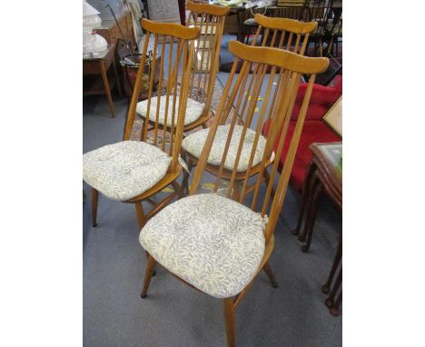 A set of four Ercol beech dining chairs with blue labels and spindle backs on turned legsLocation: FrontRow 