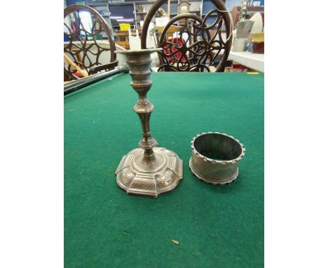 A Victorian candle stick, 10cm high together with a silver napkin ring, 140gLocation: Porter 