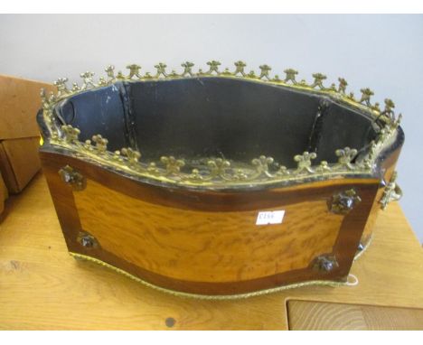 A 1930s reproduction Louis XVI planter Location: Stairs 
