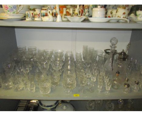 A quantity of table glass to include a Victorian and silver plated claret jug with engraved decoration, a set of six Waterfor