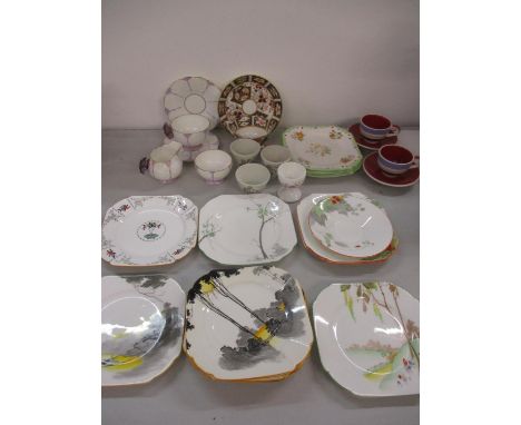 A five piece Aynsley part breakfast set having a white ground and lilac flash with a handle in the form of a purple butterfly