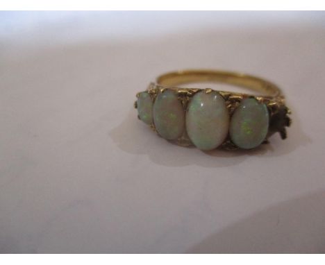 An 18ct gold and four-opal ring A/F one missing, total weight 4.47g ring size    Location: Cab 