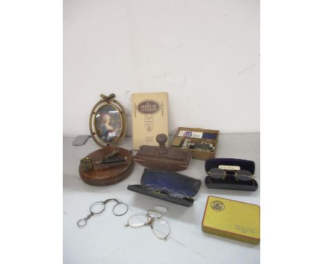 Two small boxes of items of interest to include a cigarette tin and a painted miniature in an oval frame, and four pairs of v