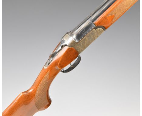 Lord 12 bore over and under shotgun with engraved lock, trigger guard, thumb lever, top plate and underside, chequered semi-p