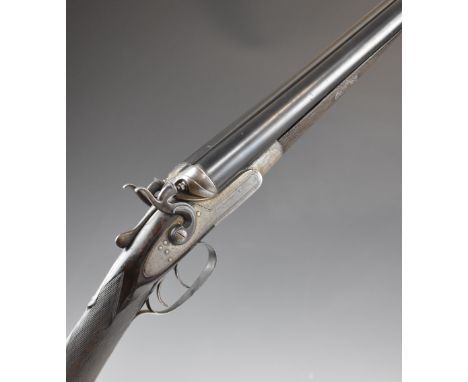 W W Greener 12 bore side by side hammer action shotgun with named and engraved lock, engraved hammers, underside and thumb le