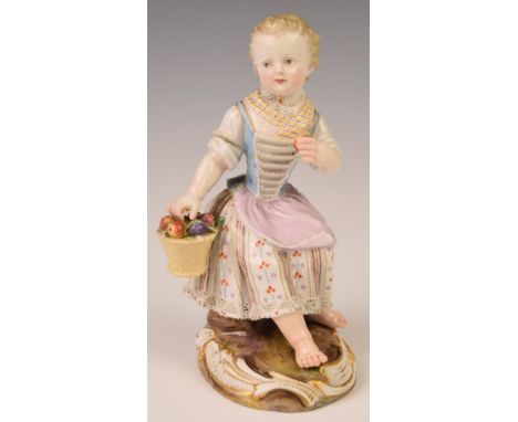 Meissen seated child figure eating an apple from a basket of fruit, with Dresden lace decoration to skirt and neck, blue cros