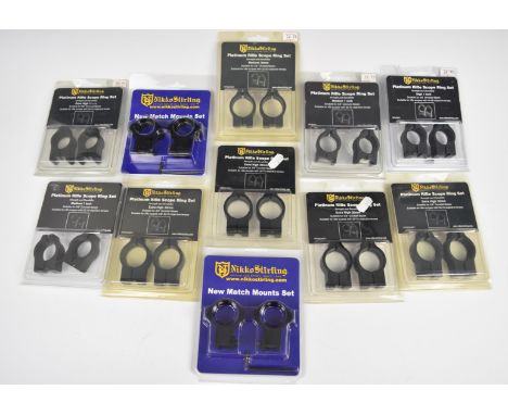 Eleven Nikko Stirling rifle or air rifle scope ring mount sets, all in original packaging.&nbsp;