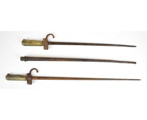 Two French 1866 pattern Lebel bayonets both with button catches, one with shortened 41cm cruciform blade, the other 52cm cruc