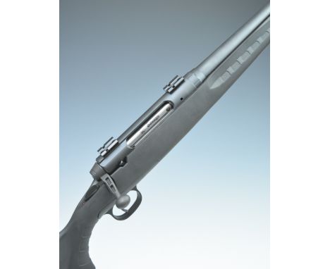Savage Axis .243 bolt-action rifle with composite stock, semi-pistol grip, sling and scope mounts and 23 inch barrel, overall
