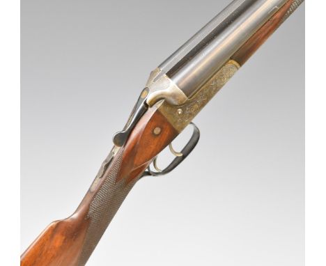 J P Sauer & Son 12 bore side by side shotgun with engraved scenes of birds to the lock, chequered grip and forend, double tri