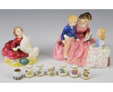 Two Royal Doulton figures comprising The Bedtime Story, Home Again, a Herend signed thimble and Royal Worcester thimbles