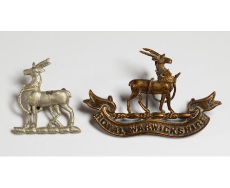 British Army Royal Warwickshire Regiment officer's collar badge, with Firmin London tablet to reverse and one other similar b