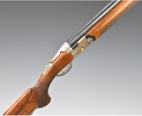 Beretta 682 Gold E 12 bore over and under ejector shotgun with gold inlaid naming, chequered semi-pistol grip and forend, ven