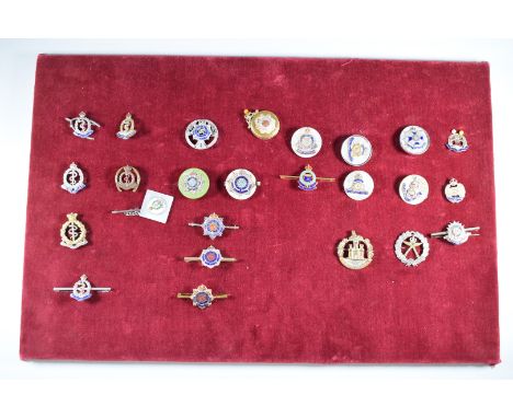 Twenty six sweetheart / pin brooches including Royal Army Medical Corps, Royal Army Service Corps, Border Regiment, Gurkhas, 