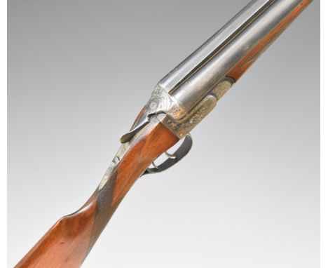Aremberi 12 bore side by side shotgun with engraved lock, trigger guard, thumb lever, fences and underside, chequered grip an