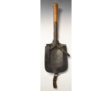 WW1 German entrenching tool with regimental markings L.J.R. 87.2B and 81. R. 15. 36 crossed through, with leather cradle and 