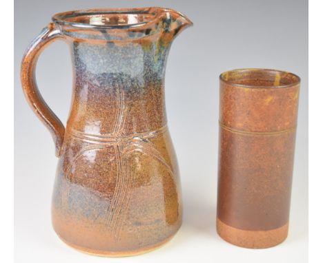 Robin Welch studio pottery sleeve vase and a studio pottery jug, tallest 24cm