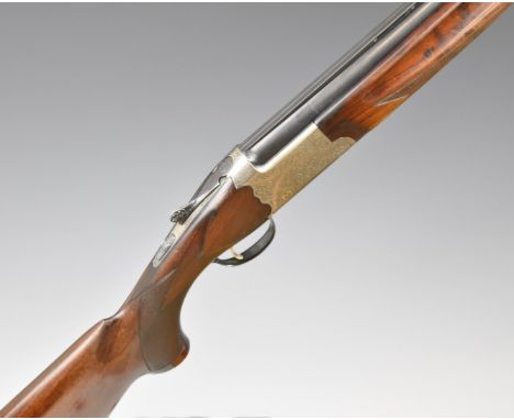 IAB Tiger Trap 12 bore over under ejector shotgun with engraved locks, trigger guard, underside, top plate, thumb lever and f