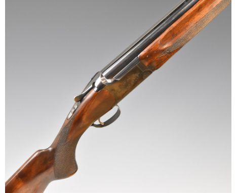 Miroku 12 bore over and under ejector shotgun with engraved locks and underside, chequered semi-pistol grip and forend, singl