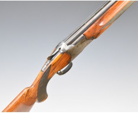 Winchester 101 12 bore over and under ejector shotgun with engraved lock, trigger guard, thumb lever, top plate and underside