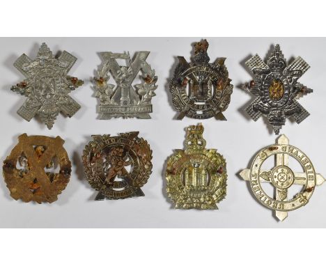 Eight British Army Scottish Regiment badges including London Scottish, King's Own Border Regiment and Black Watch