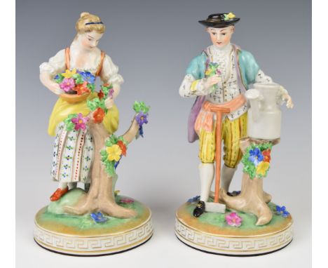 Pair of Dresden male and female allegorical gardening figures, height 22cm