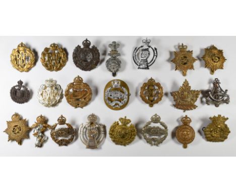 A small collection of badges including Royal Tank Corps, Royal Armoured Corps, Royal Air Force, Royal Engineers, Army Service