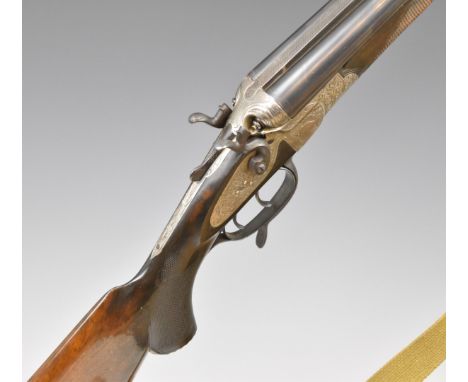 Remo 12 bore and .410 triple barrelled hammer action shotgun with engraved decoration, chequered semi-pistol grip and forend,