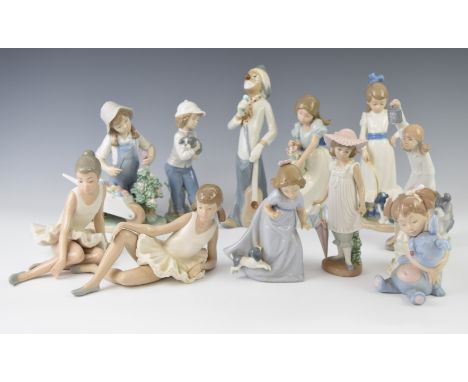 Twelve Nao figures including children and girl with flowers, tallest 25cm