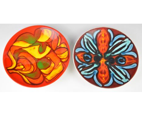 Two Poole Pottery chargers, diameter 26.5cm