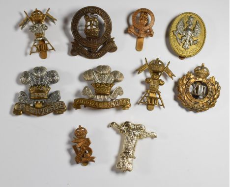 Ten British Army Cavalry Regiment badges including 10th Royal Hussars, 11th Hussars and 9th Lancers