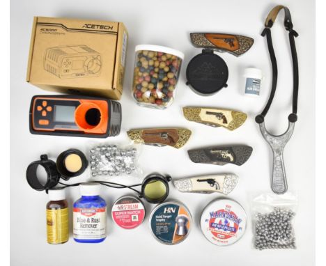 A collection of gun and shooting related items including knives, Acetech AC5000 chronograph, air rifle pellets etc