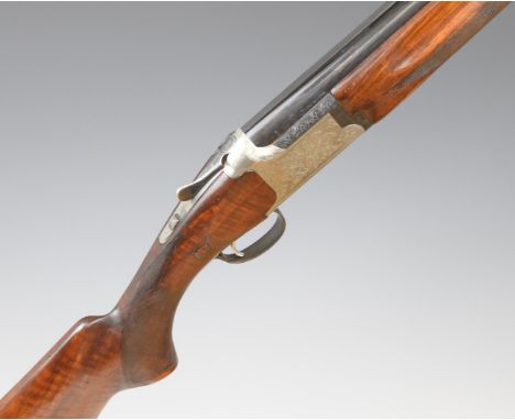 Miroku 12 bore over and under ejector shotgun with engraved locks, trigger guard, top plate, thumb lever and underside, chequ