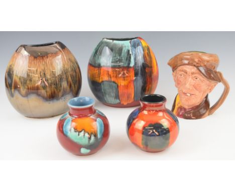 Four Poole Pottery vases and a Royal Doulton character jug 'Arry, tallest 18cm