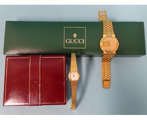 A gentleman’s gold-plated Gucci wrist watch, model no.9200M, (boxed) and a lady’s gold-plated Rotary wrist watch, (boxed), (2