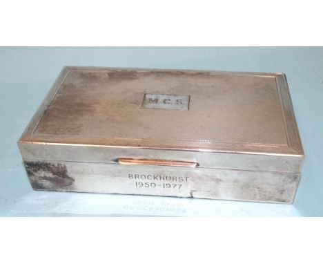 A George V silver rectangular cigarette box with engine-turned lid, 15.5 x 9cm, Birmingham 1924, 4cm high, etched initials to