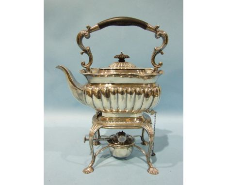 A spirit kettle of oblong half-gadrooned shape, on shell feet, by Mappin &amp; Webb, 1915, 1850g, ___59.5oz.