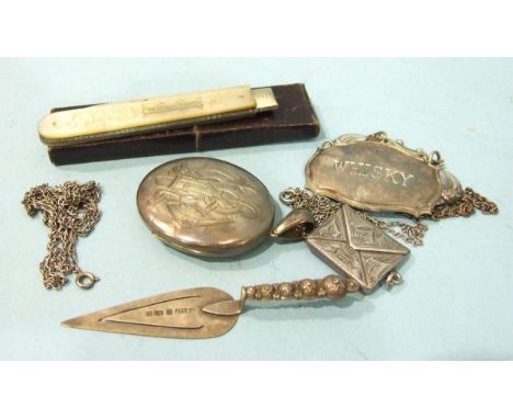 A silver trowel bookmark, 1912, a mother-of-pearl-handled fruit knife in case, a silver stamp holder and other items.