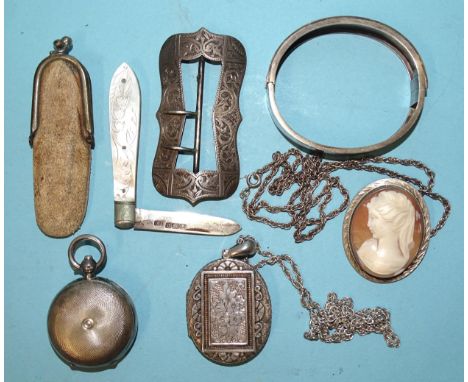 An engine-turned silver sovereign case, Birmingham 1911, a silver buckle, a mother-of-pearl-handled fruit knife, a silver loc