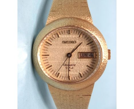 Seiko, a 1970's quartz V.F.A. 18ct gold wrist watch, 3823-5005, the oval textured dial with baton numerals, centre seconds an