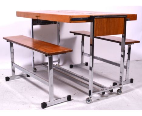 An unusual folding buffet/ table, circa 1970, teak on chrome support, with folding mechanism that converts the two tier buffe