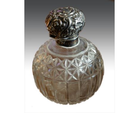 A cut glass spherical scent bottle, embossed silver mount, William Hutton & Sons, London 1897, 13.5cm.